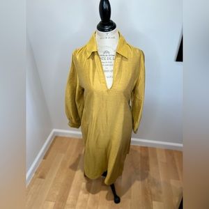 Gold dress with collar and belt. I have worn it one time.